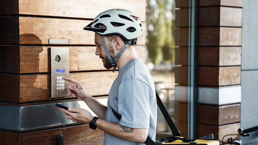 resident-on-bike,at-doorbell